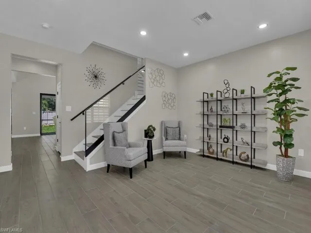 Living room with spacious seating area offers versatility of the space