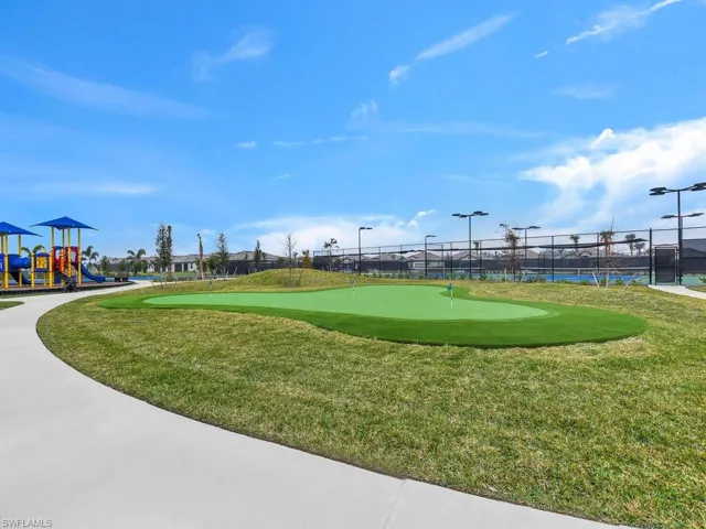 Putting green near playground