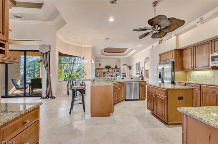 Kitchen & Breakfast Bar looking towards Sliders View 4