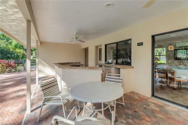 View of patio featuring covered area
