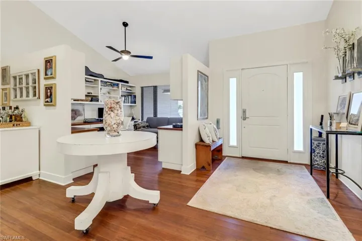Entry Foyer with Vaulted Ceilings looking into the home office