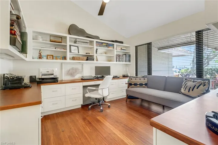 Home Office/ Den with Custom Cabinets, Vaulted Ceiling, Impact Windows