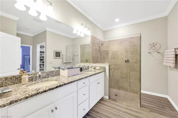 master bath dual sinks, walk-in shower, seamless glass