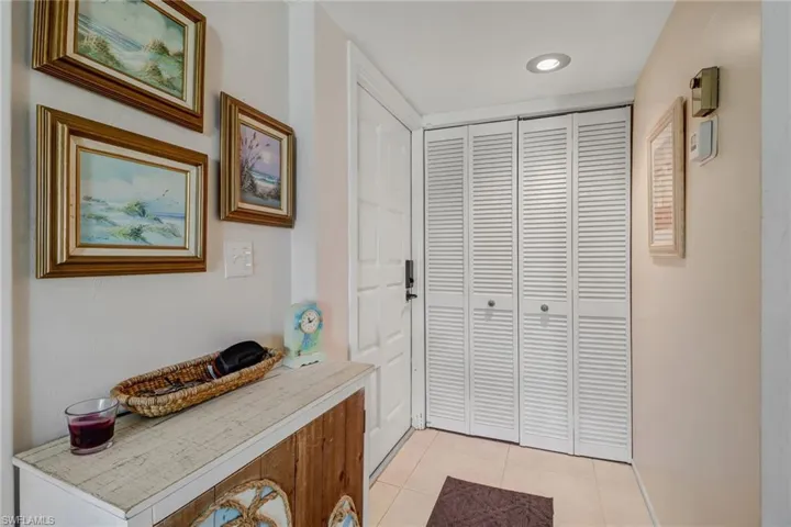 Entryway featuring light tile patterned floors