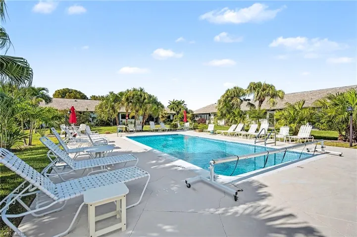 Community pool featuring a patio area