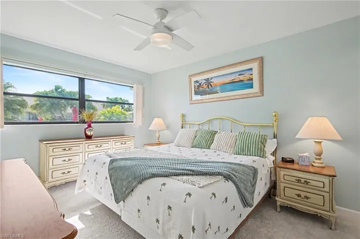 Bedroom with carpet flooring and ceiling fan