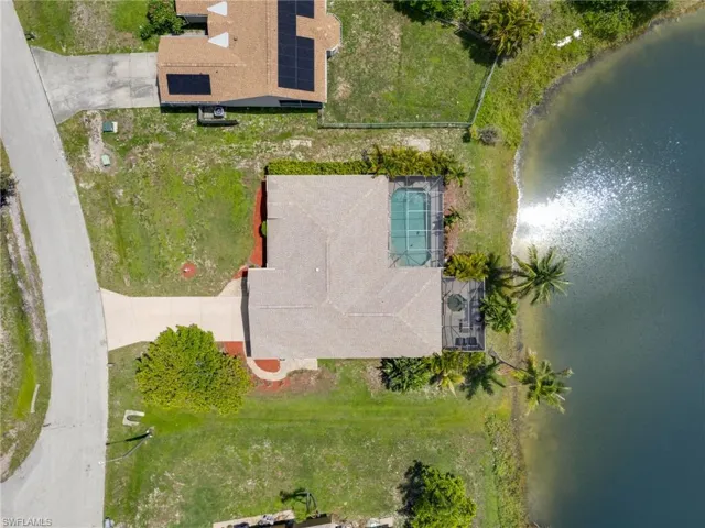 View of subject property featuring a large body of water