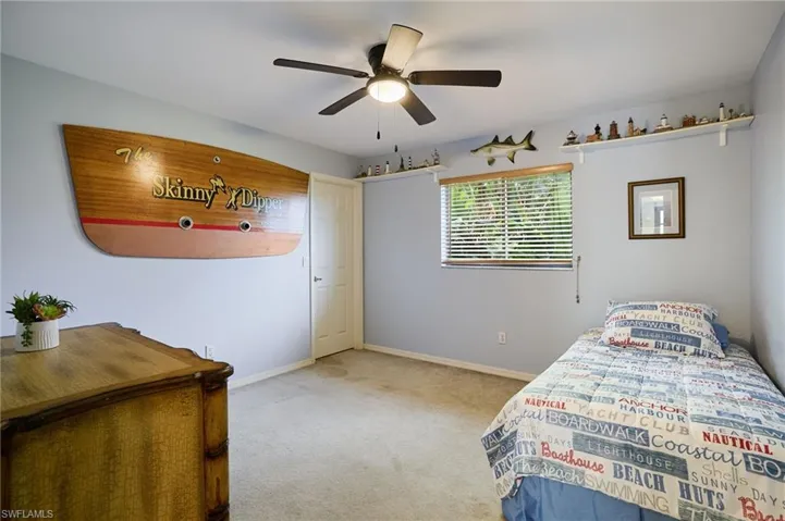 Bedroom featuring carpet floors and ceiling fan