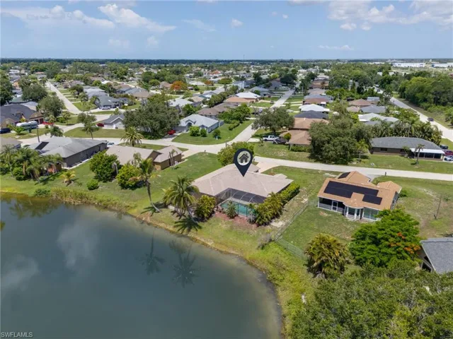 Aerial view of residential area with a nearby body of water