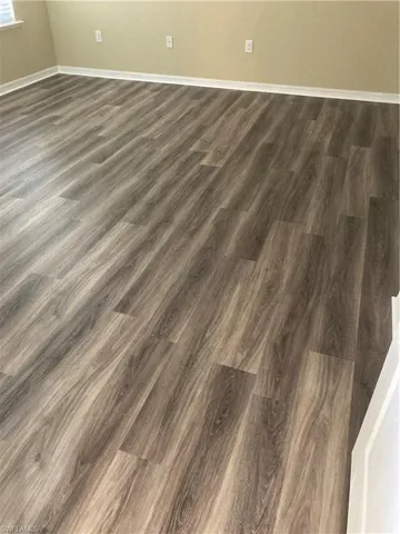 Interior details featuring hardwood / wood-style flooring