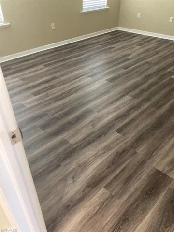 Interior details with hardwood / wood-style flooring
