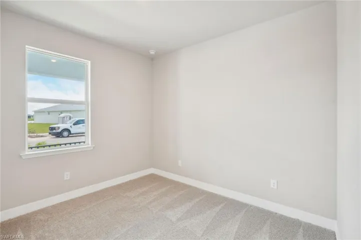 View of carpeted spare room