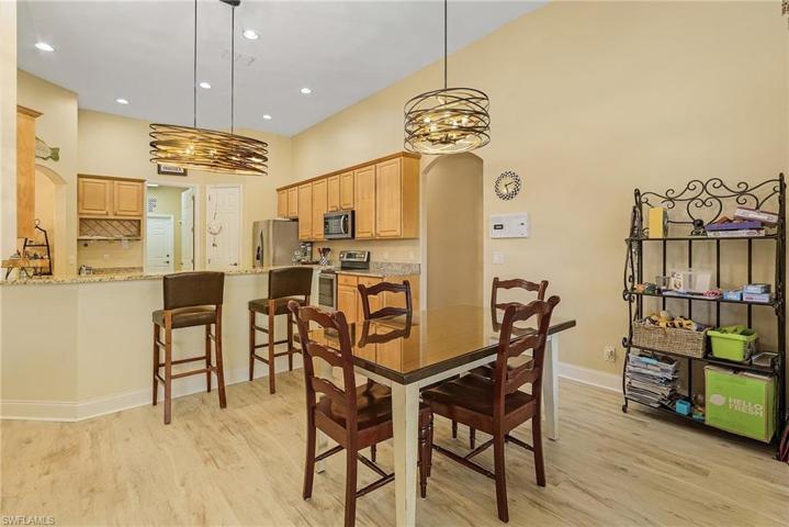 Enjoy the golf course views from this great room.