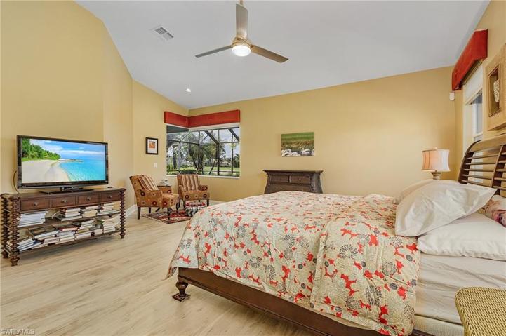Owner's suite has new floors, lighted ceiling fan, large walk-in closet.