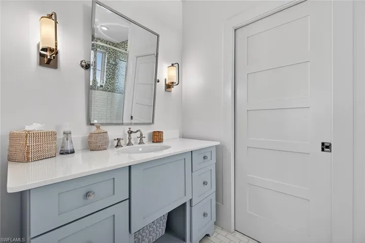 En-Suite full bathroom featuring vanity and a shower with curtain