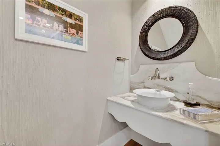 Main living area powder bathroom with vanity