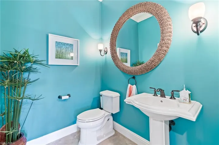 Half bathroom with baseboards