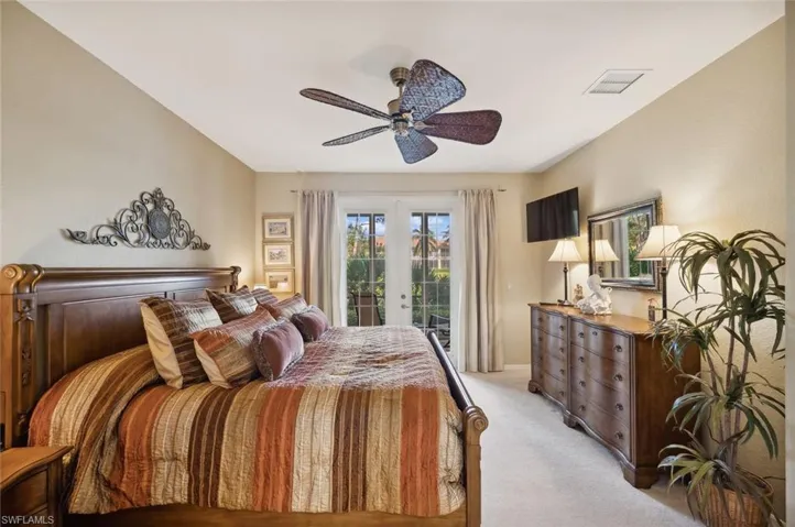 Master Bedroom opens to glassed in Florida room