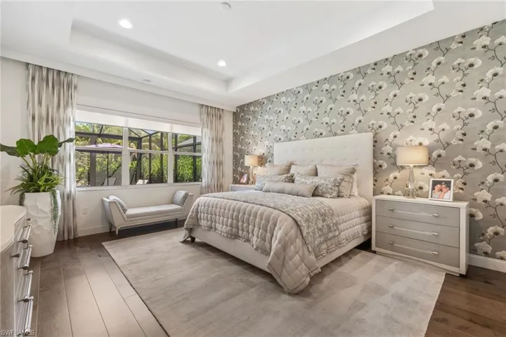 primary bedroom with engineered hardwood
