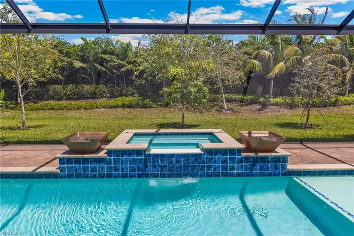 gorgeous pool with fountains