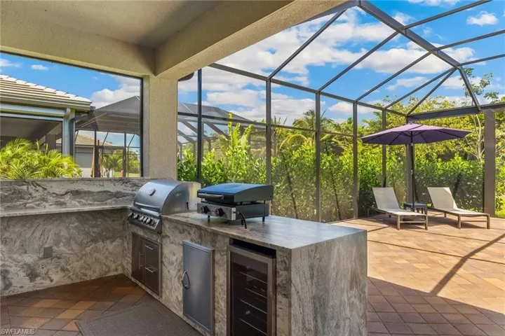 Gorgeous outdoor kitchen with countertop griddle