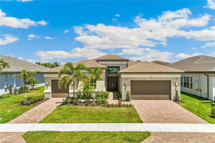 popular spacious floorplan with 3 bedrooms plus den located in the active adult resort-style community of Valencia Trails in Naples, Florida