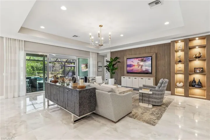 Custom built-in features, polished porcelain flooring, open floorplan.