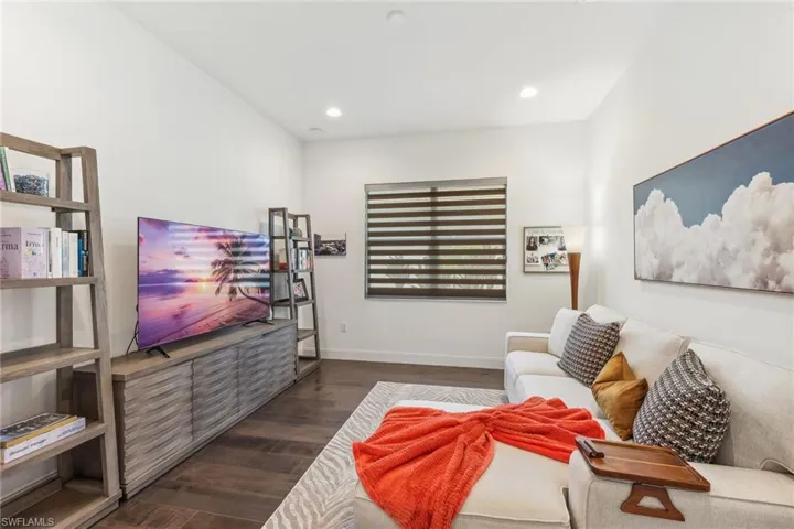 office or den with engineered hardwood floor