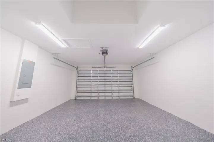Garage featuring electric panel
