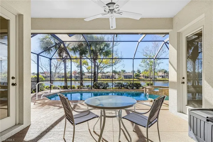 covered lanai overlooking pool and lake