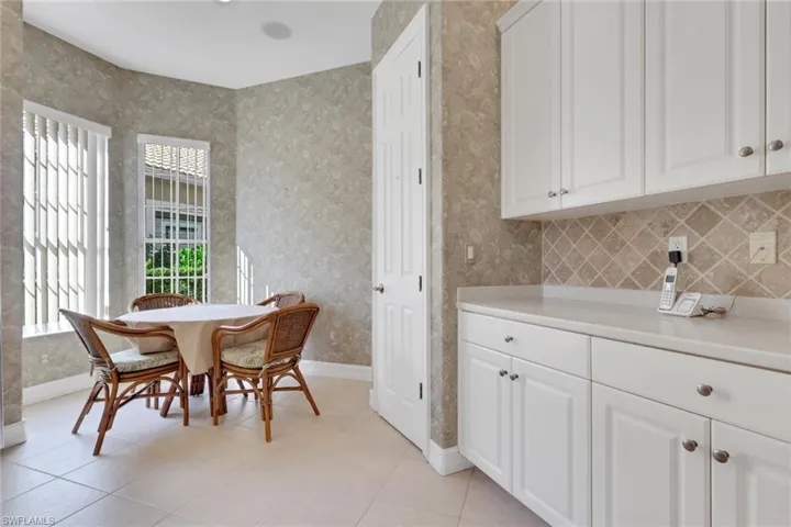 Dining room featuring baseboards and light tile patterned floors