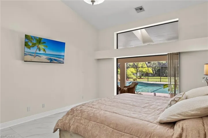 Bedroom with visible vents, baseboards, access to outside, and marble finish floor