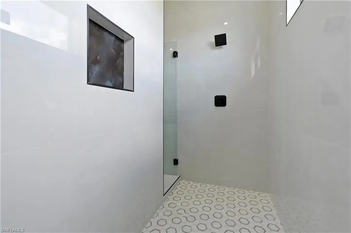 Bathroom with a tile shower