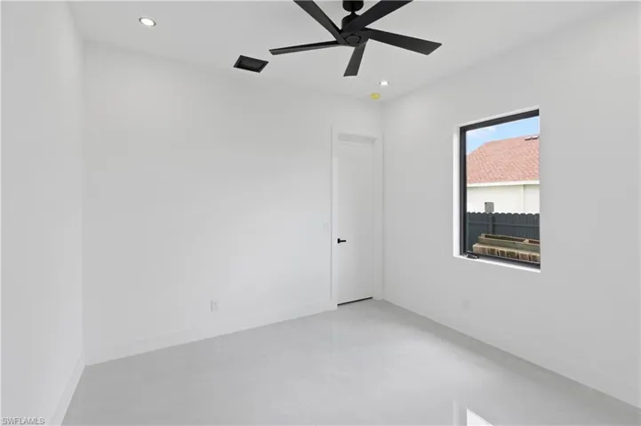Unfurnished room with ceiling fan