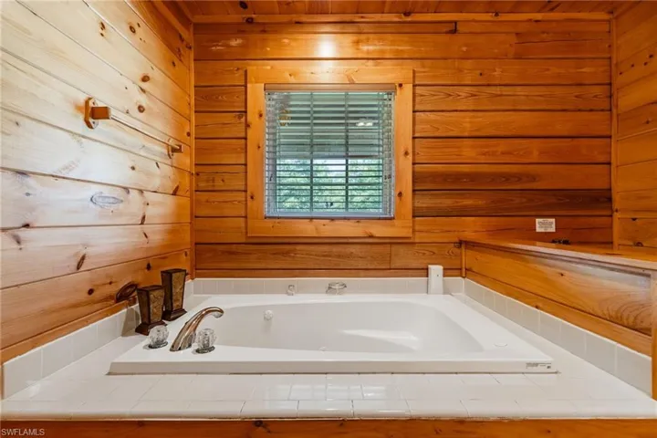 Full bath with a bath