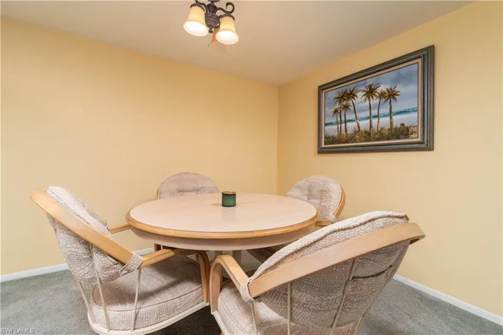 View of carpeted dining area