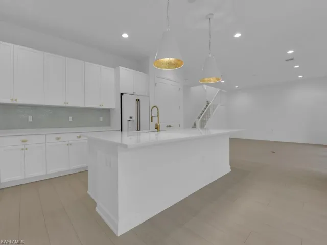 Kitchen w/ Long Breakfast Bar