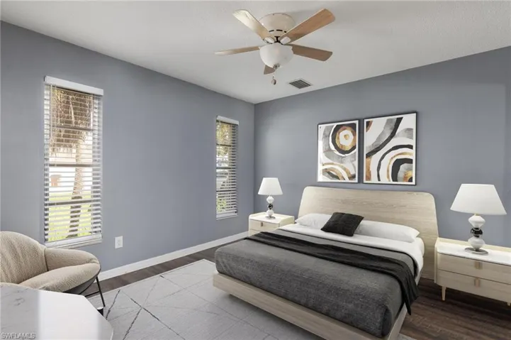 Bedroom with wood finished floors and a ceiling fan