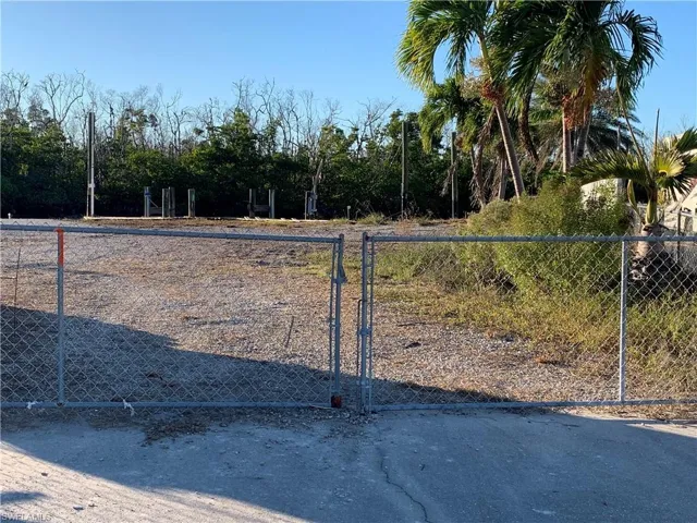 Large gated entrance to lot.