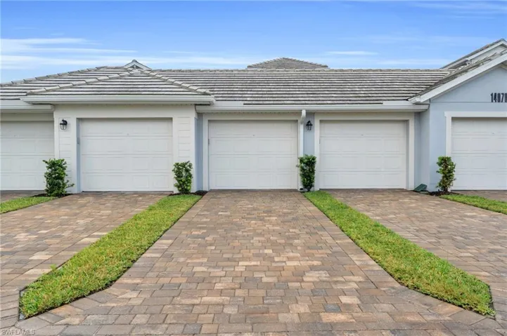 Ranch-style home with a garage