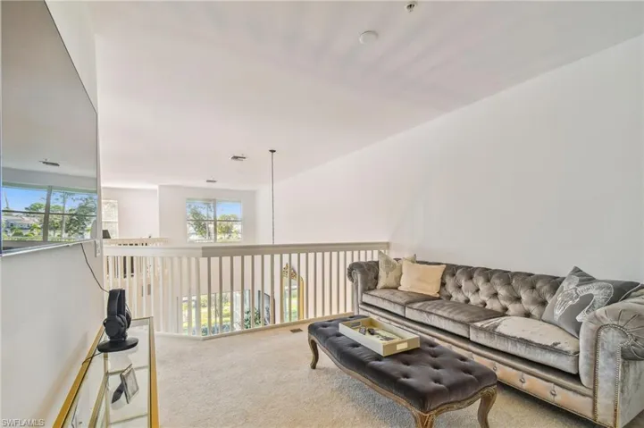 View of carpeted loft