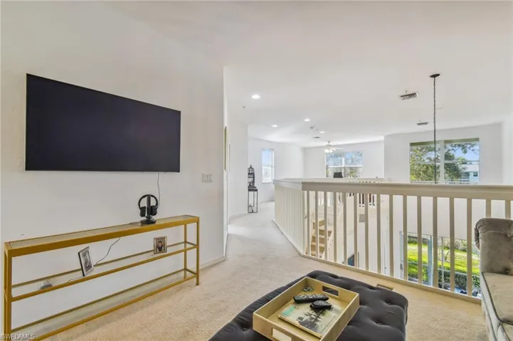 View of carpeted loft