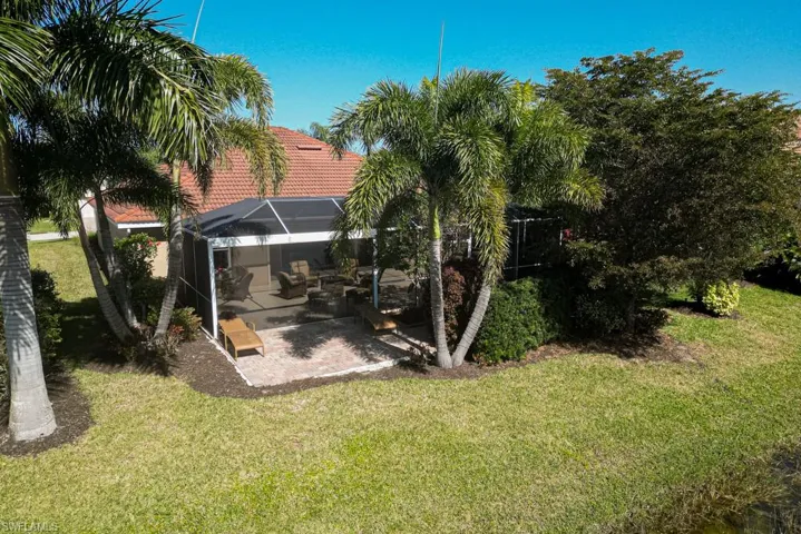 View of yard with a patio area and a lanai
