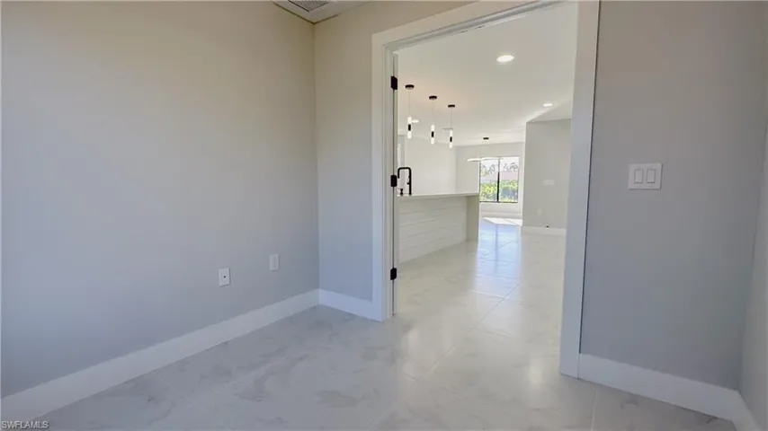 View of tiled empty room