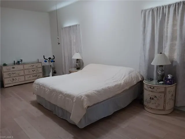 Master Bedroom 1 featuring light wood-type flooring