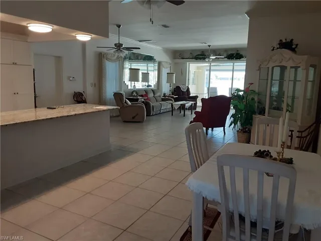 Dining room featuring light tile patterned floors