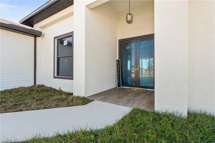 Doorway to property with french doors