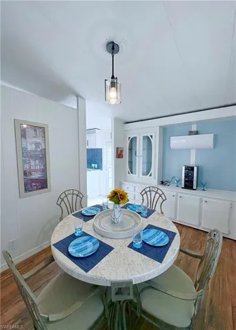 Dining space featuring wood finished floors