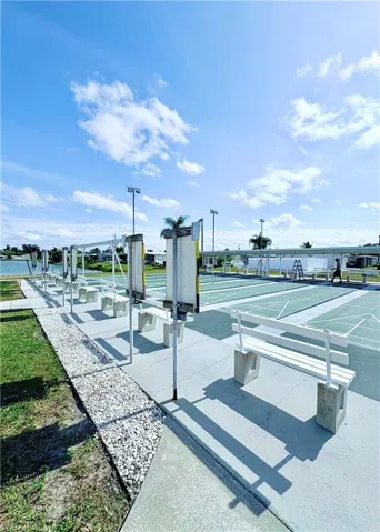 View of community featuring shuffleboard