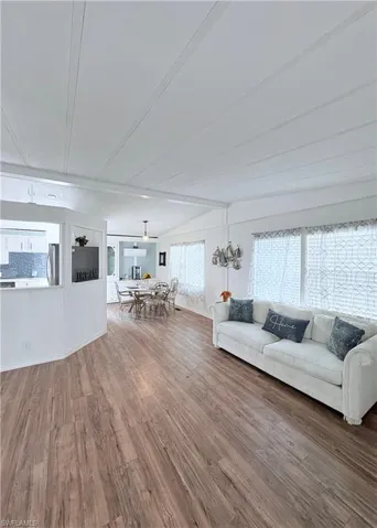 Living area featuring wood finished floors